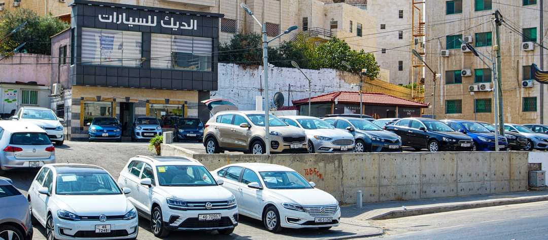 شعار معرض الديك لتجارة السيارات