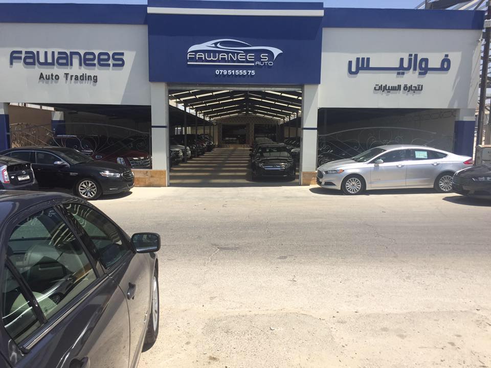 شعار معرض معرض فوانيس لتجاره السيارات 